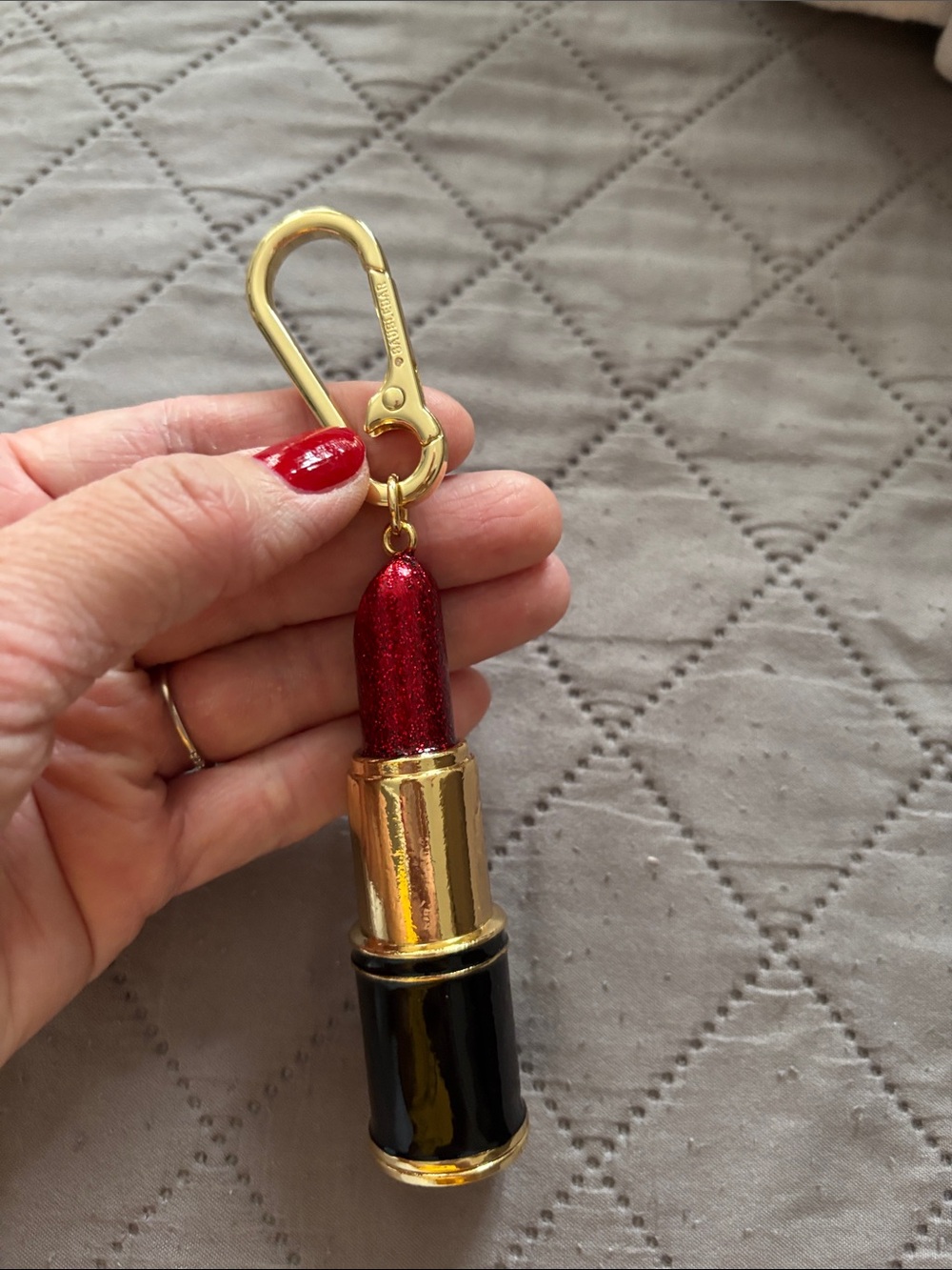 BaubleBar Gold and Red Lipstick Keychain with Black Base